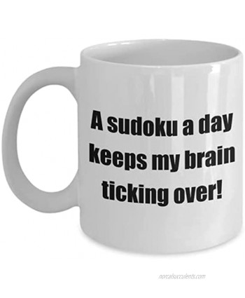 Puzzles Classic Coffee Mug: A sudoku a day keeps my brain. Great Present For Your Friends And Colleagues! White 11oz